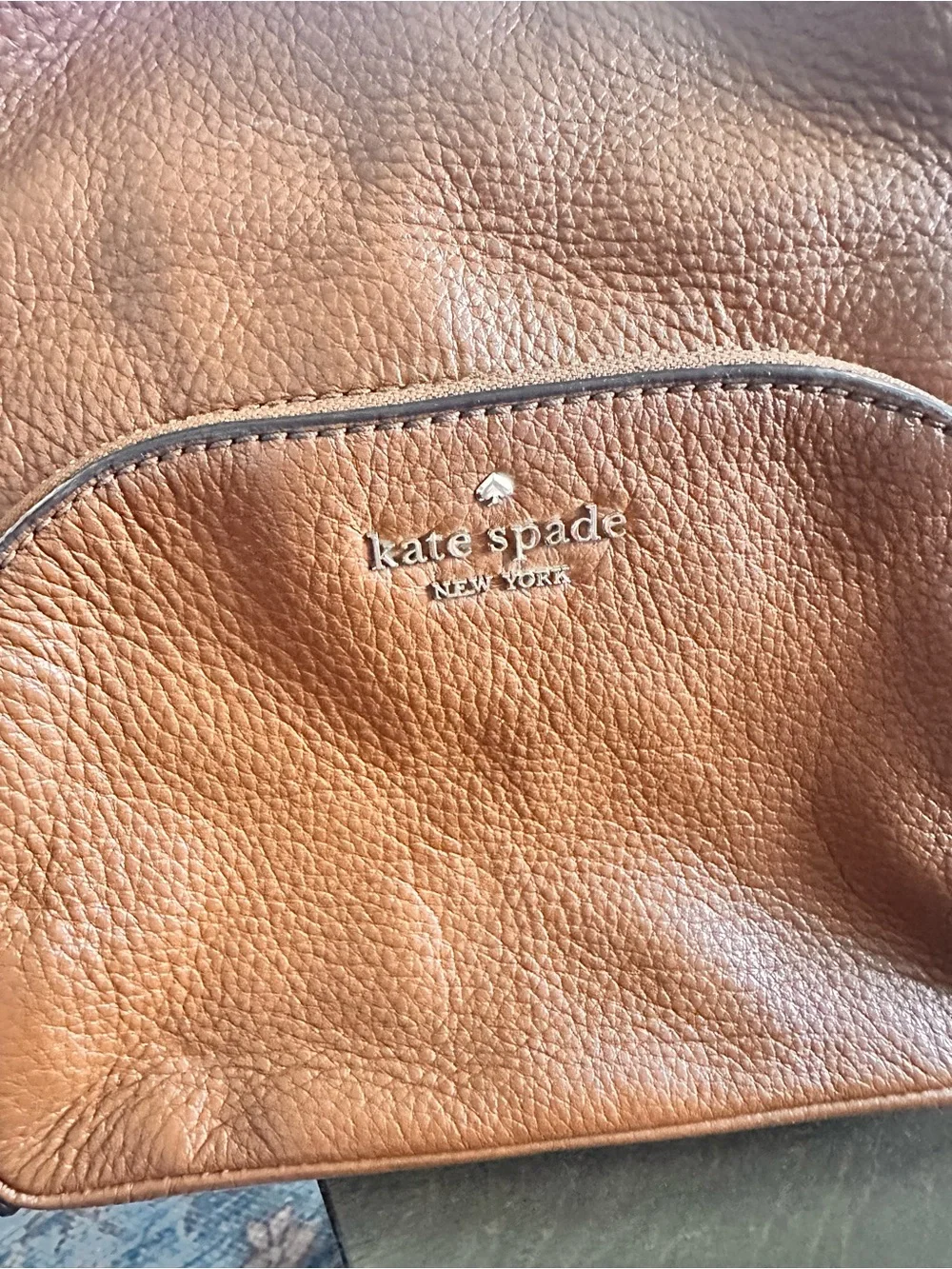 Kate spade pebbled leather mini back pack in camel